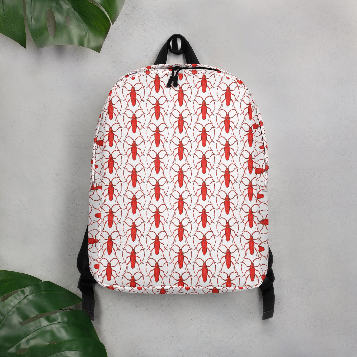 Red beetle design by Kirsten Blackburn on minimalist backpack