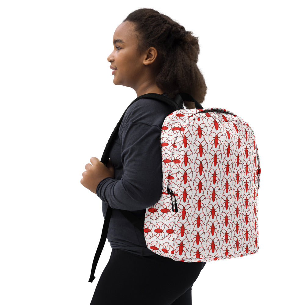 Red beetle design by Kirsten Blackburn on minimalist backpack