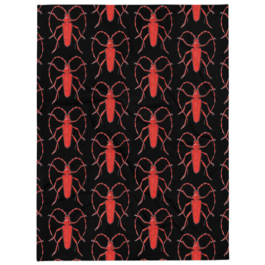 Red Beetle design by Kirsten Blackburn on black throw blanket 60x80