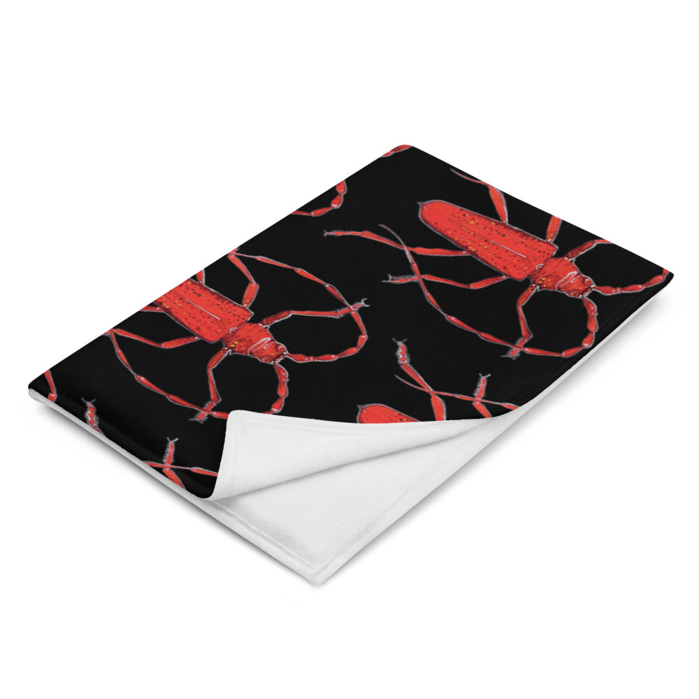 Red Beetle design by Kirsten Blackburn on black throw blanket 60x80