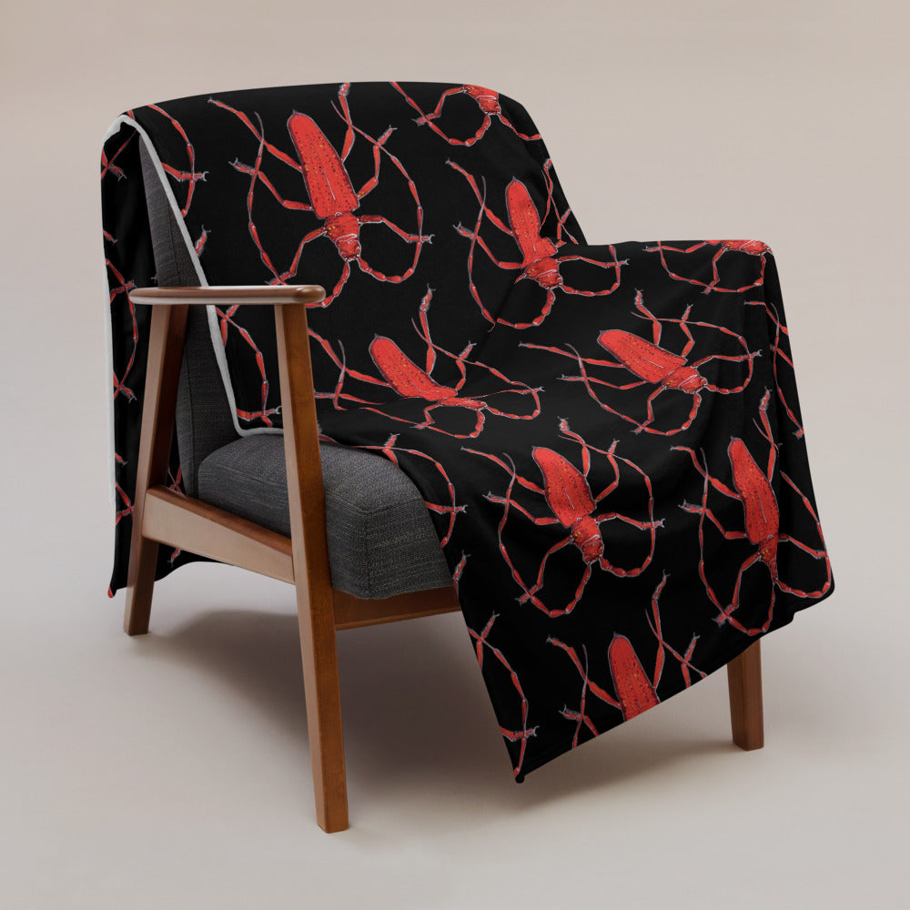 Red Beetle design by Kirsten Blackburn on black throw blanket 60x80