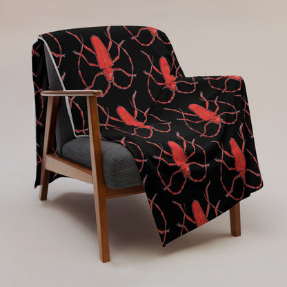 Red Beetle design by Kirsten Blackburn on black throw blanket 60x80