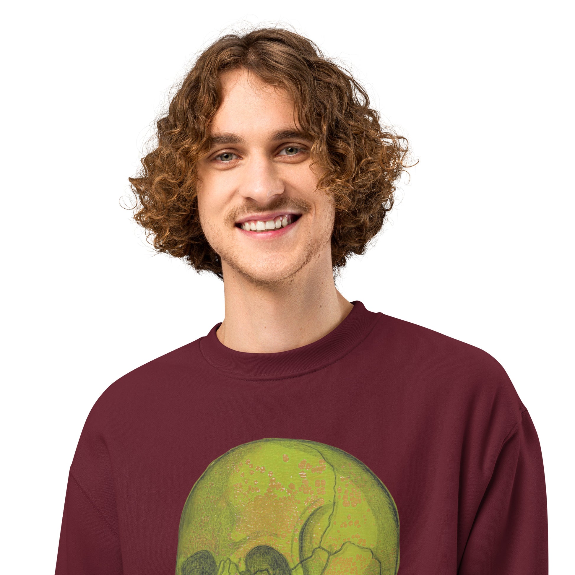 Green Skull design by Kirsten Blackburn on oversized heavyweight sweatshirt