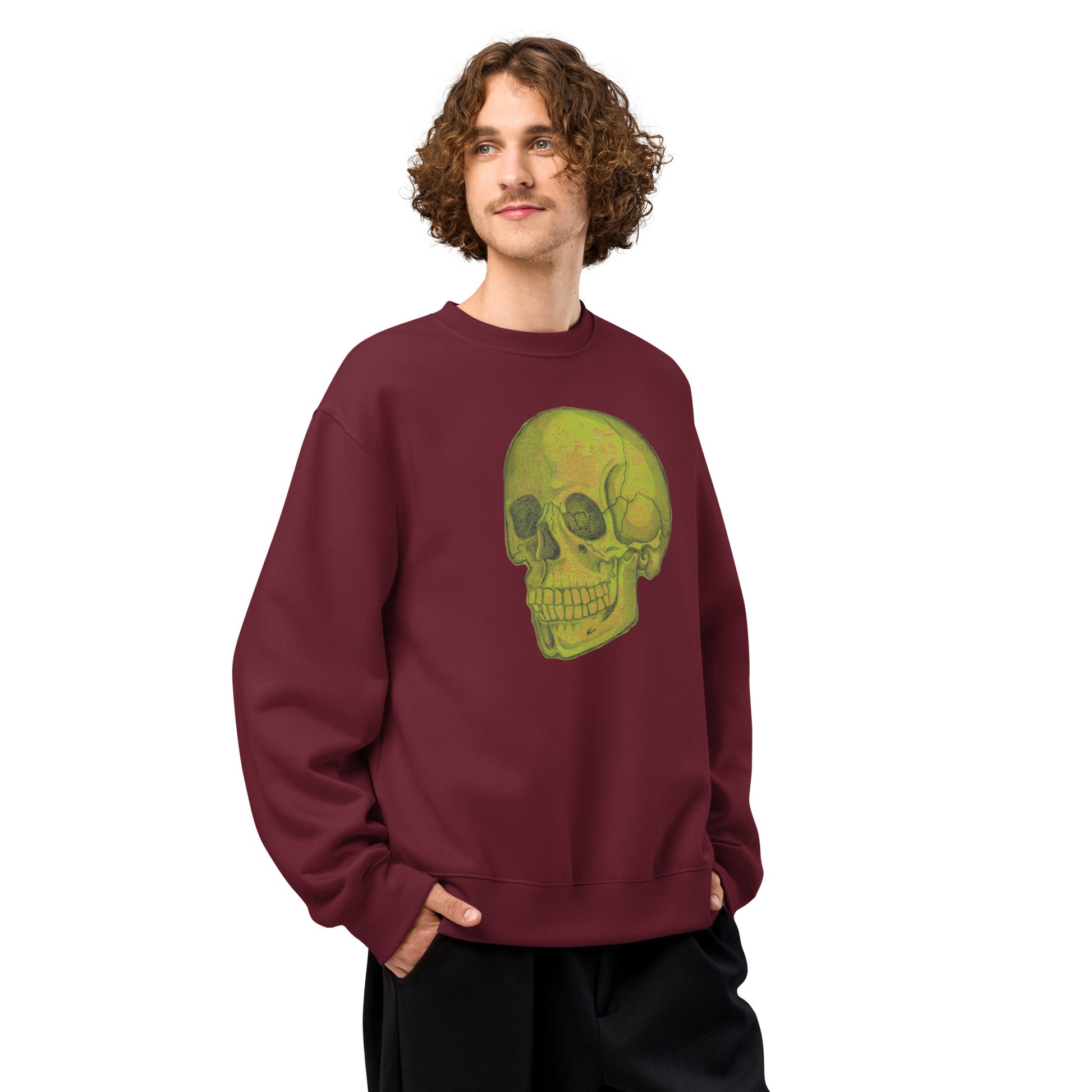 Green Skull design by Kirsten Blackburn on oversized heavyweight sweatshirt