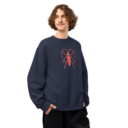 Red Beetle design by Kirsten Blackburn on oversized heavyweight sweatshirt