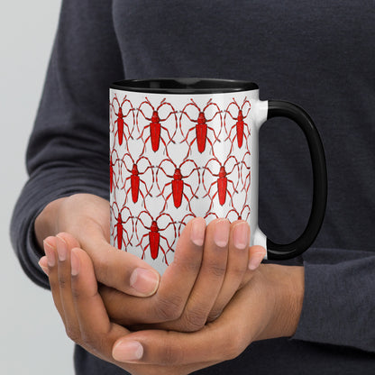 Red Beetle Parade design by Kirsten Blackburn on 15oz glossy mug with colored interior