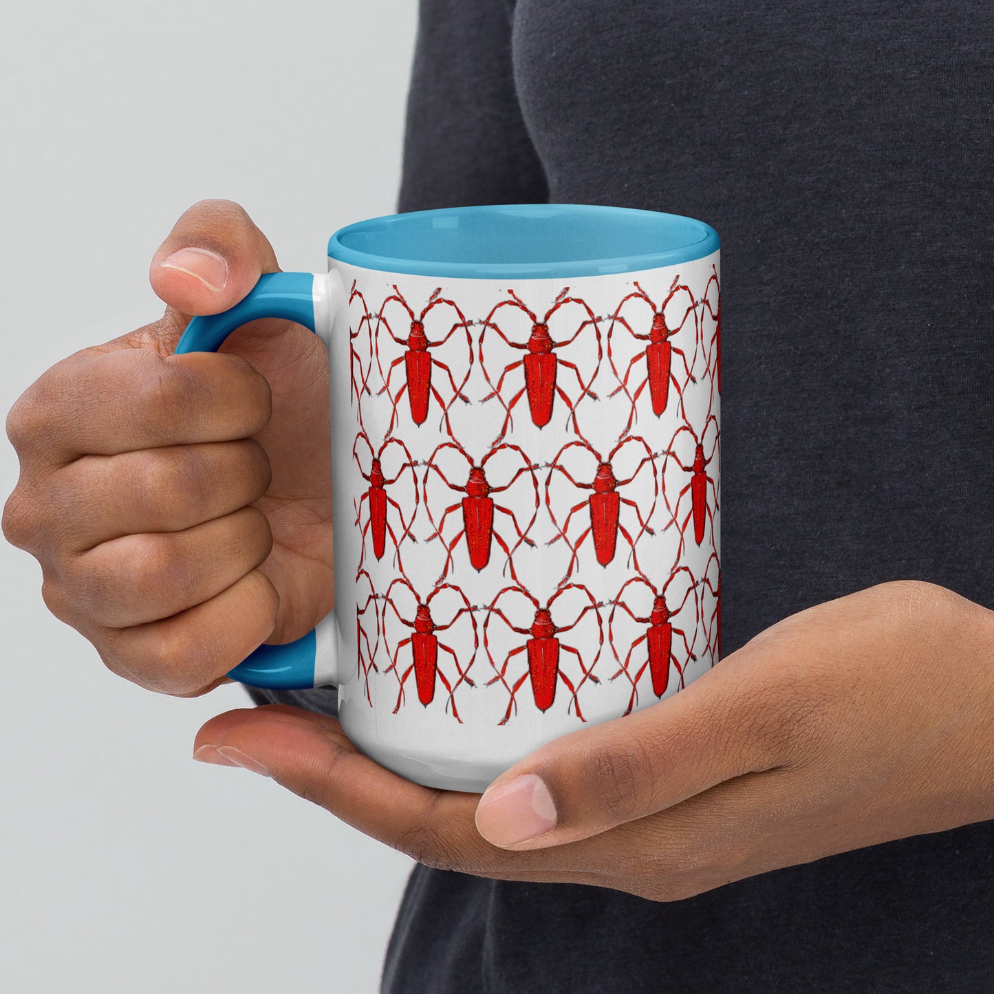 Red Beetle Parade design by Kirsten Blackburn on 15oz glossy mug with colored interior