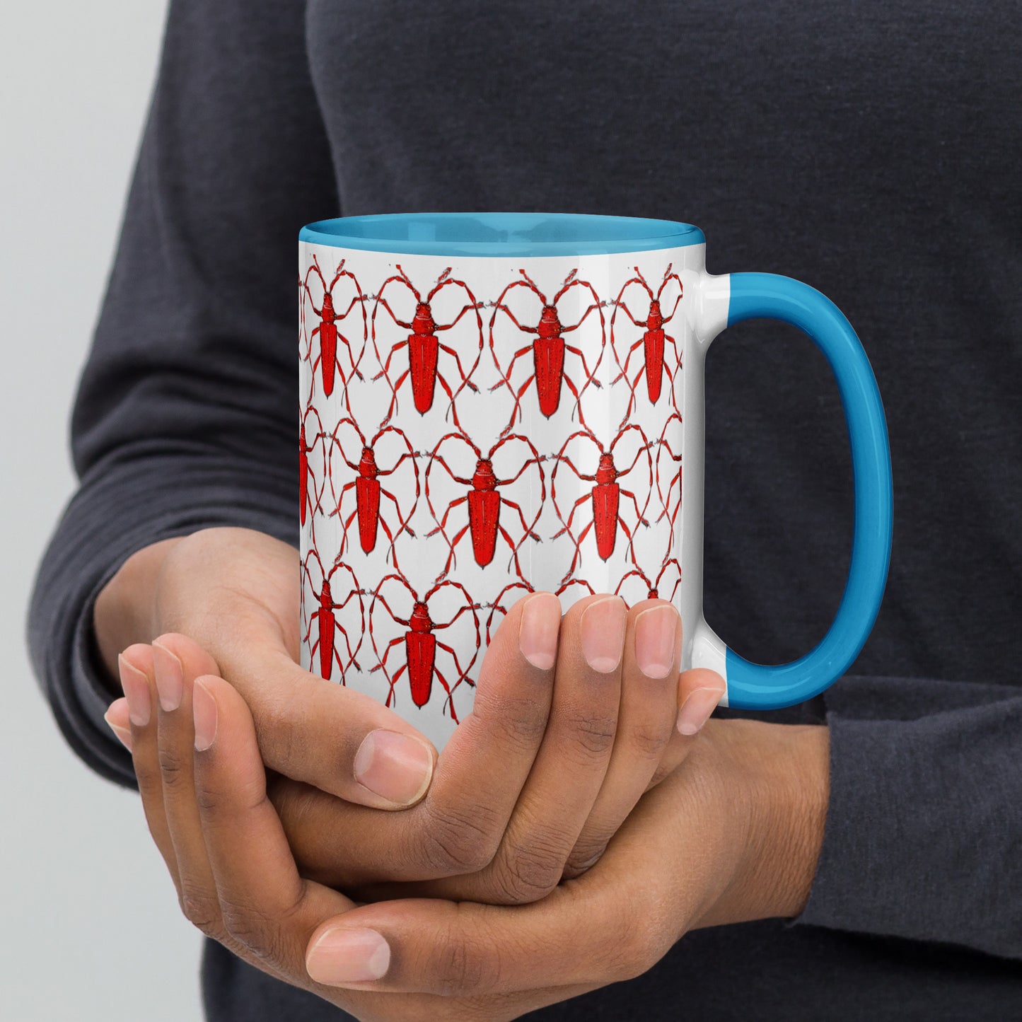 Red Beetle Parade design by Kirsten Blackburn on 15oz glossy mug with colored interior