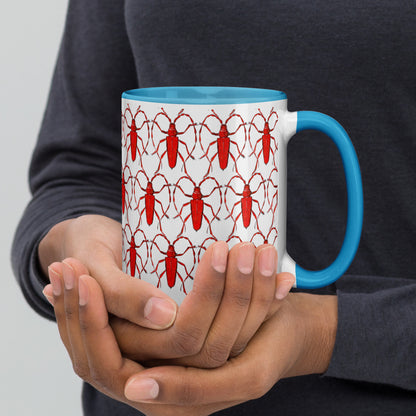 Red Beetle Parade design by Kirsten Blackburn on 15oz glossy mug with colored interior